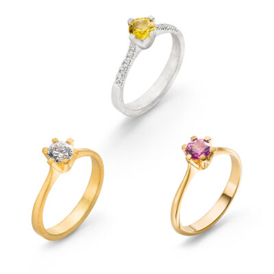 Zeitlose Antragsringe aus Fai trade Gold mit pinkem Saphir, Diamant und gelbem Saphir