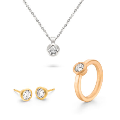 kette ohrringe und ring mit diamanten in bezel fassung aus der spotlight kollektion von jan spille